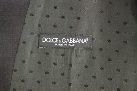 Black wool formal dress vest by Dolce & Gabbana, tailored fit with sleek design, front button closure, and classic V-neck style.