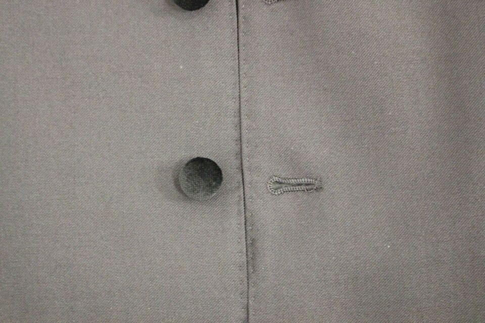 Black wool formal dress vest by Dolce & Gabbana, tailored with a sleek fit and classic design for elegant occasions.