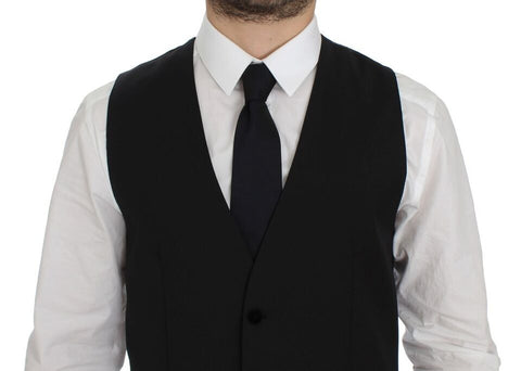 Black wool formal dress vest by Dolce & Gabbana, featuring tailored fit and classic design, suitable for elegant occasions.