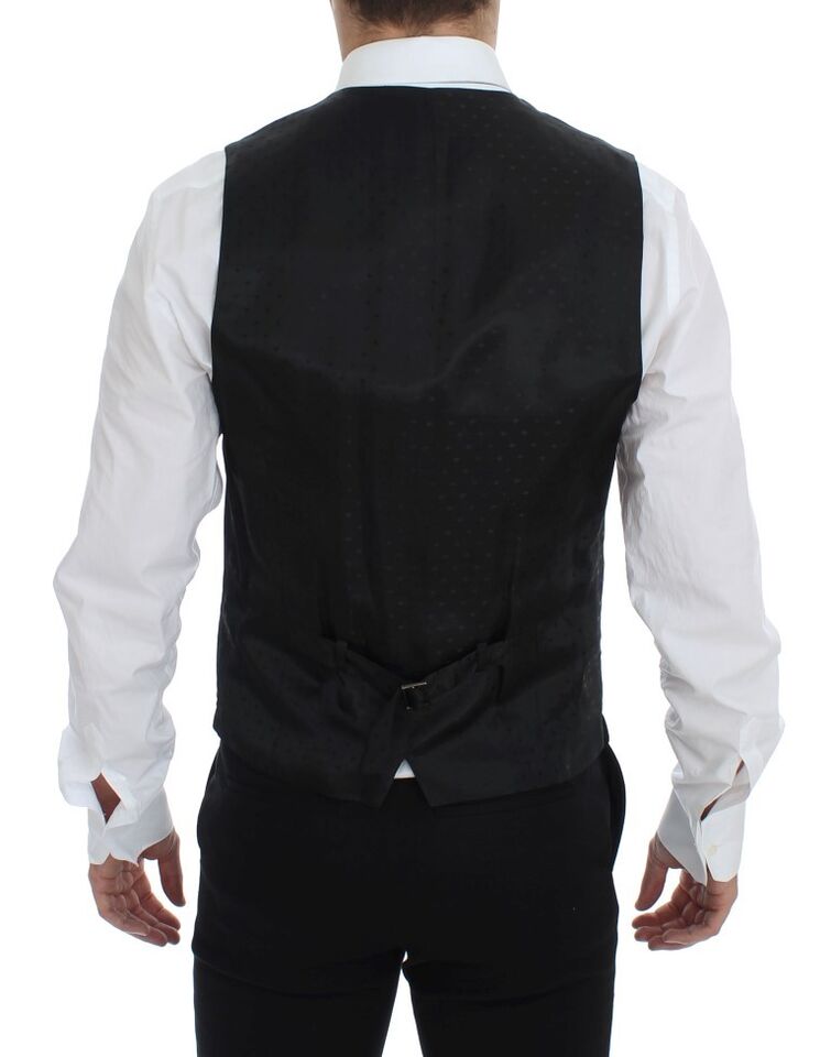 Black wool formal dress vest by Dolce & Gabbana, showcasing a tailored sleeveless gilet with a sleek, sophisticated design.