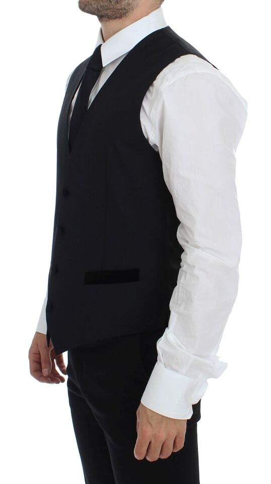 Black wool formal dress vest by Dolce & Gabbana, tailored gilet with sleek design and fine stitching, suitable for sophisticated occasions.