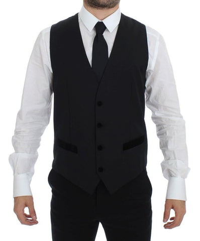 Black wool formal dress vest by Dolce & Gabbana, tailored gilet with sleek design, ideal for sophisticated men's fashion.