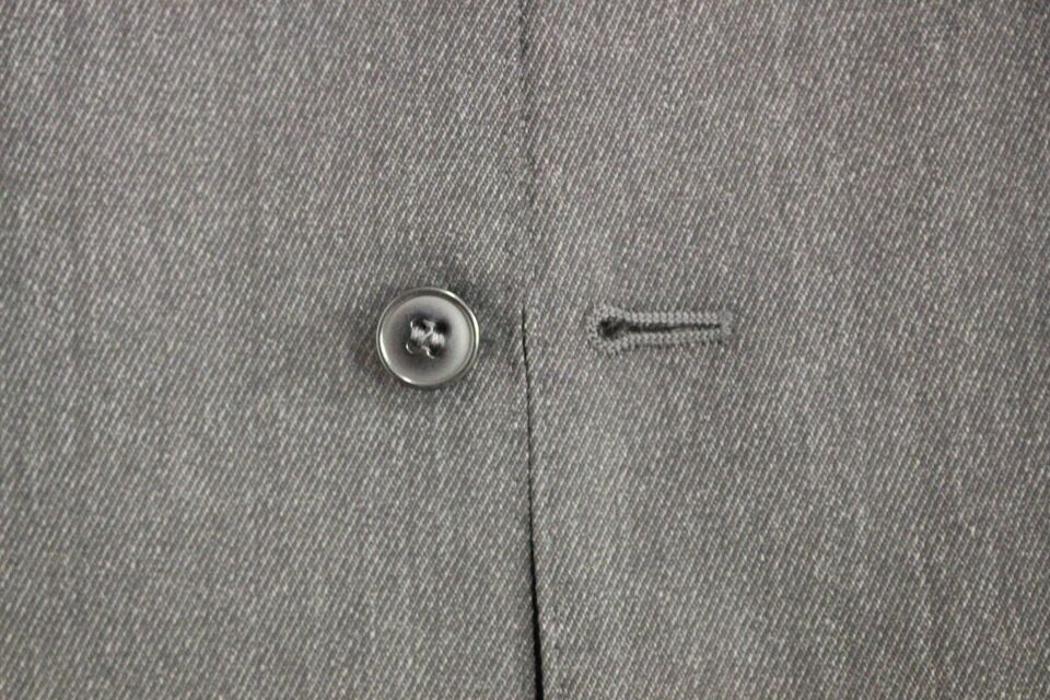 Gray wool formal dress vest by Dolce & Gabbana, tailored fit with classic lapel and sleek design for sophisticated occasions.