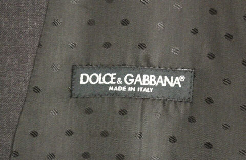 Gray wool formal dress vest by Dolce & Gabbana, tailored men's gilet with classic design and refined texture.