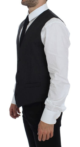 Gray wool formal dress vest by Dolce & Gabbana, tailored fit gilet with classic design and button closure, suitable for elegant occasions.