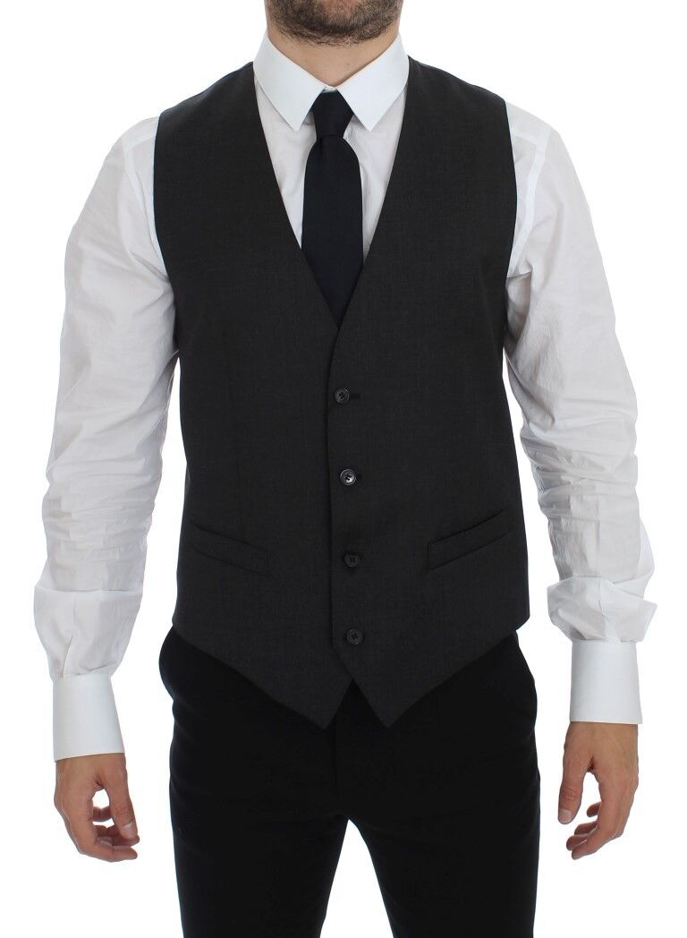 Gray wool formal dress vest by Dolce & Gabbana, stylish men's gilet with tailored fit and refined lapel details.