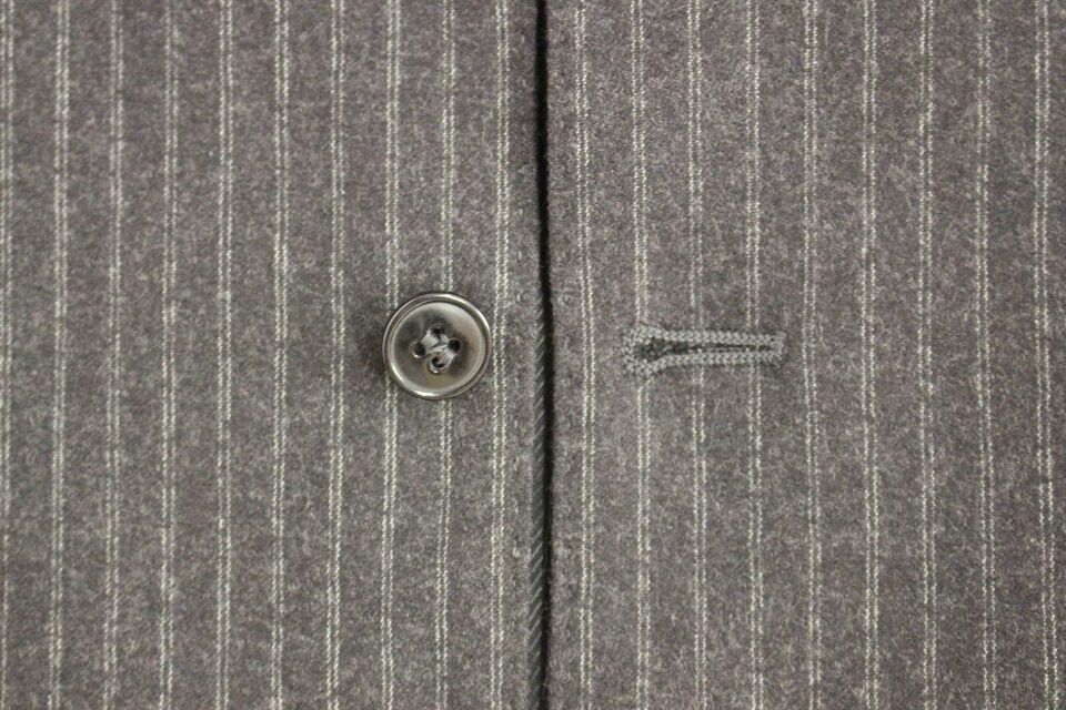 Gray striped wool single-breasted vest by Dolce & Gabbana, featuring a tailored fit and classic design.