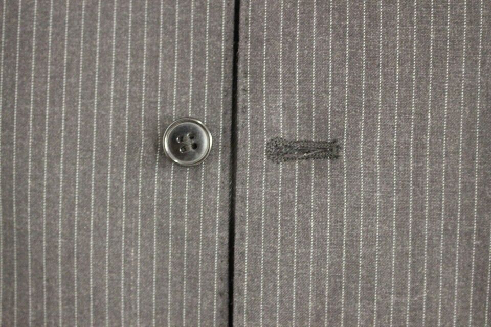 Gray striped wool single-breasted vest by Dolce & Gabbana, featuring tailored fit and classic design.