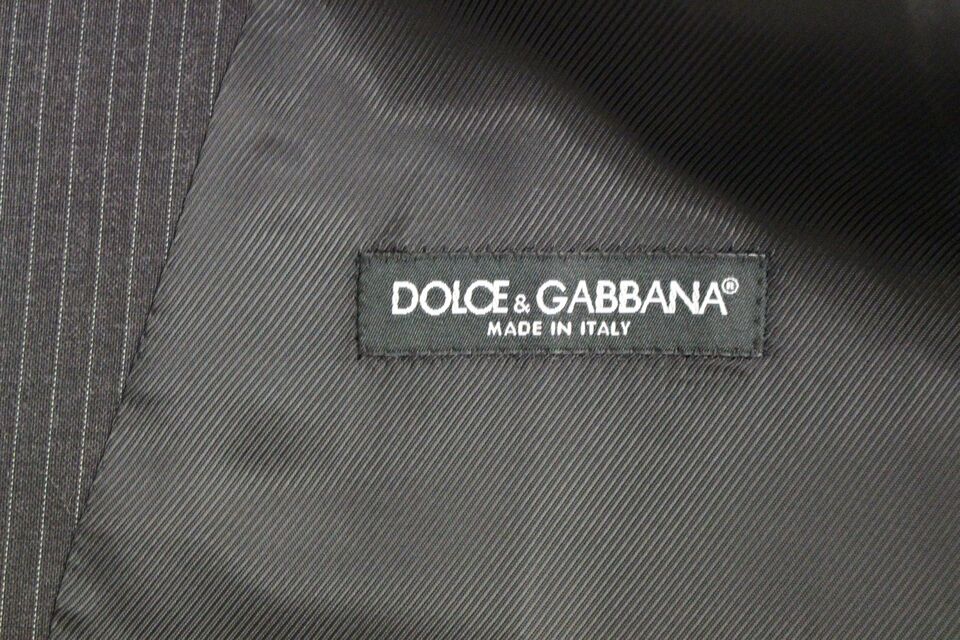 Gray wool single-breasted vest with navy and white stripes from Dolce & Gabbana, tailored fit with button closure.