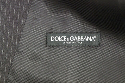 Gray wool single-breasted vest with navy and white stripes from Dolce & Gabbana, tailored fit with button closure.