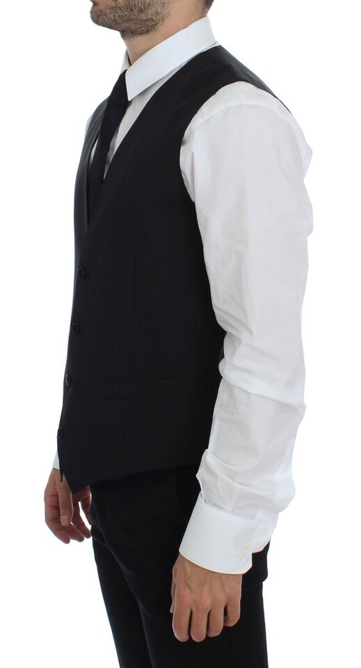 Black striped wool single-breasted vest by Dolce & Gabbana, featuring tailored fit and classic button closure.
