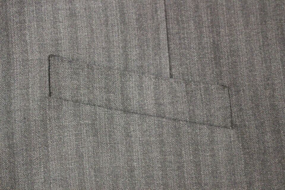 Gray striped wool single-breasted vest by Dolce & Gabbana, featuring tailored fit and classic design details.