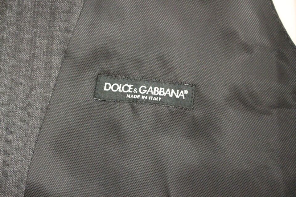 Gray striped wool single-breasted vest by Dolce & Gabbana, featuring tailored fit and classic button closure.