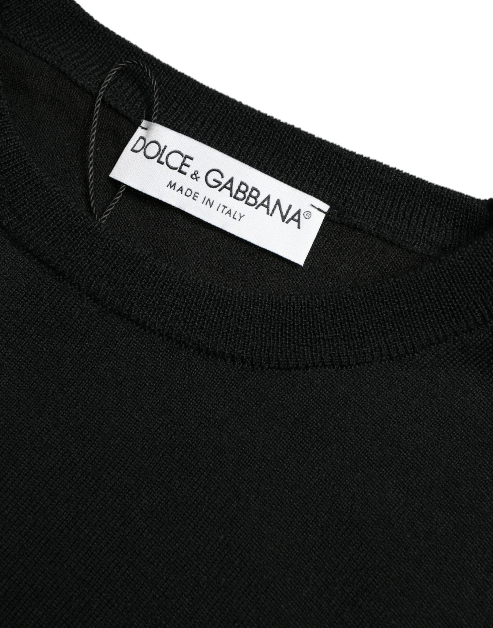 Black wool round neck pullover sweater by Dolce & Gabbana displayed on a mannequin, showcasing its classic fit and soft texture.