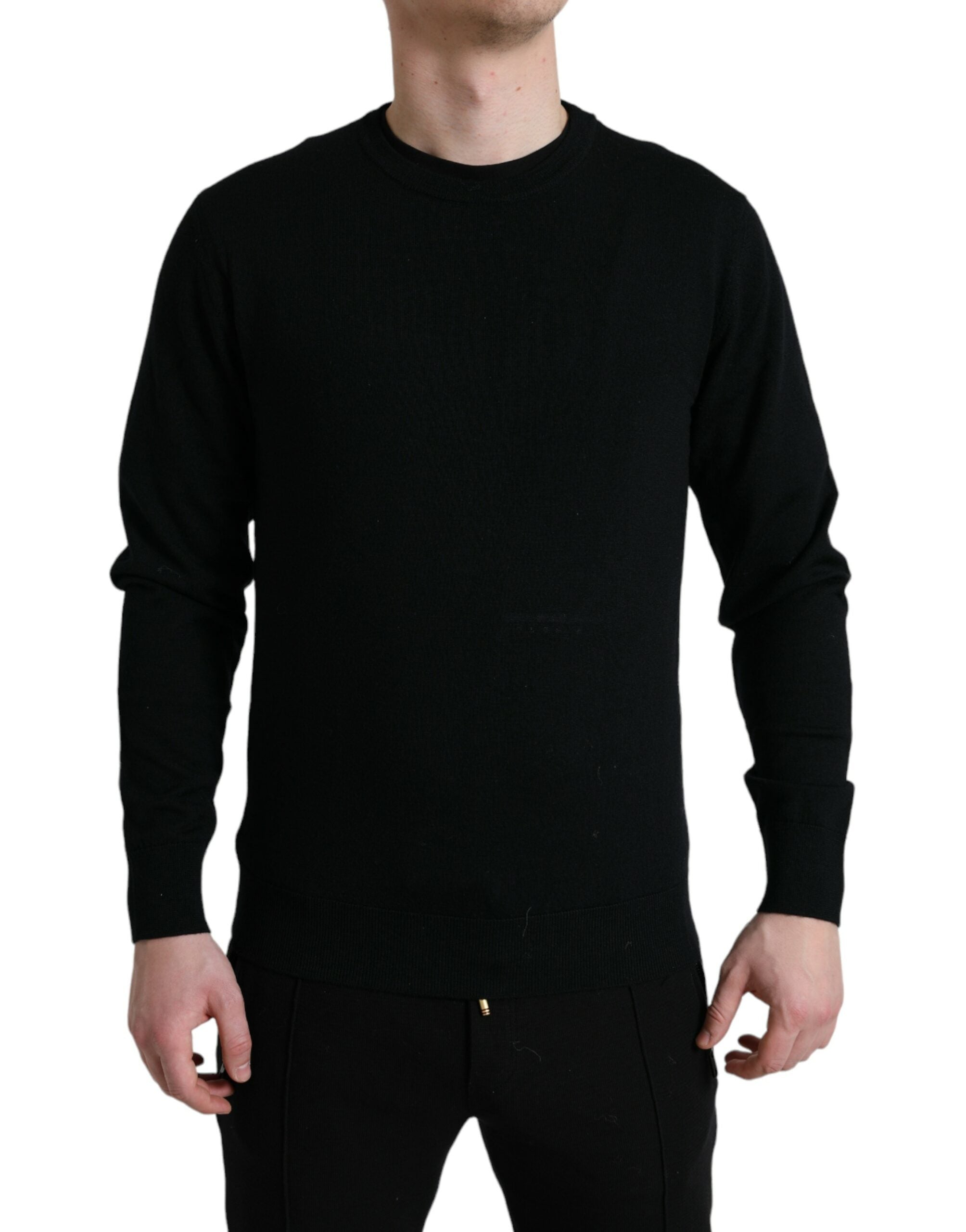 Black wool round neck pullover sweater by Dolce & Gabbana, featuring a close-up of the textured knit fabric.