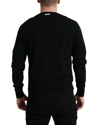 Black wool round neck pullover sweater by Dolce & Gabbana, featuring a classic fit and smooth knit fabric.
