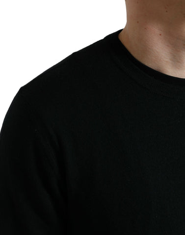 Black wool round neck pullover sweater by Dolce & Gabbana, close-up showing soft knit fabric and classic fit.