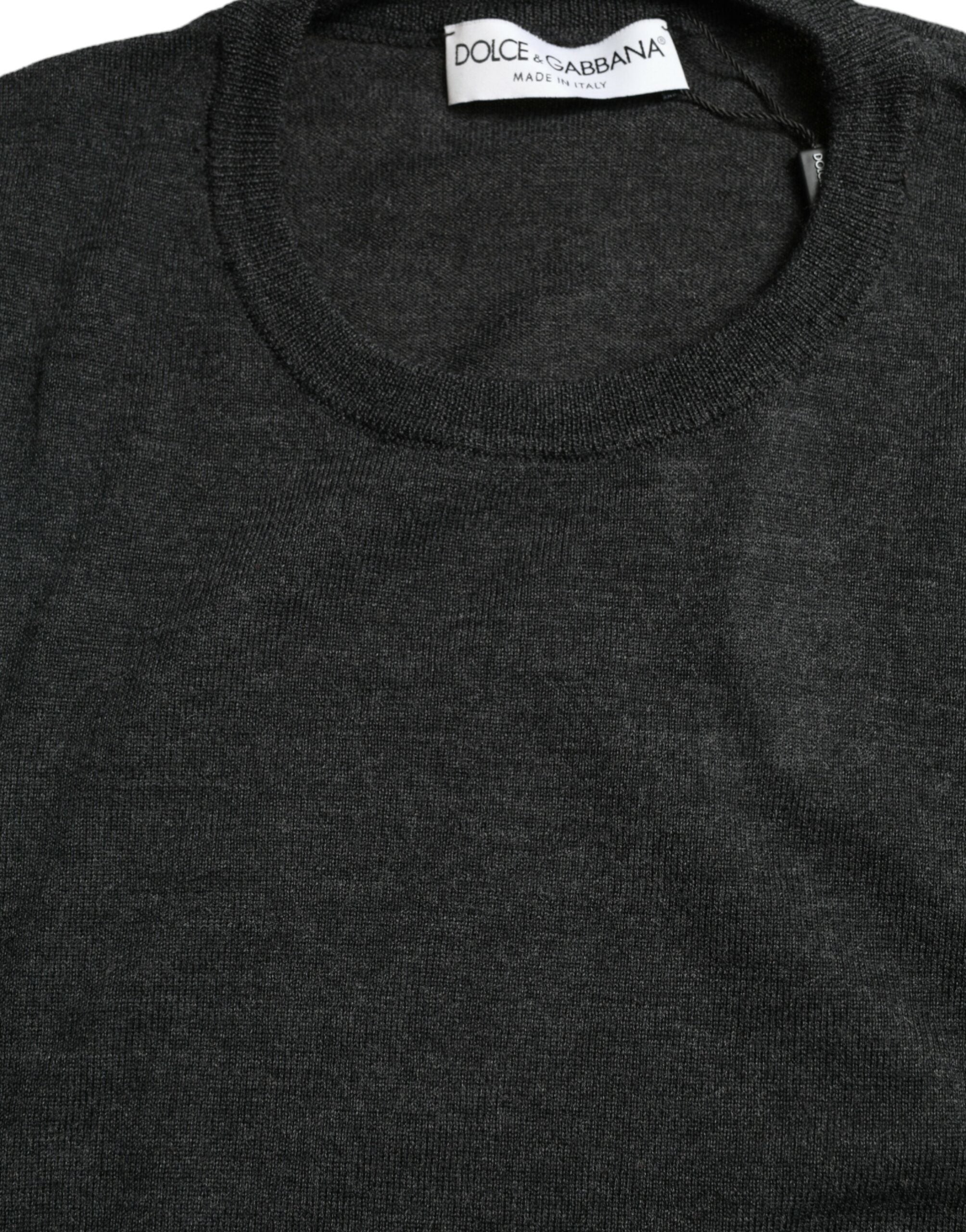 Gray wool round neck pullover sweater by Dolce & Gabbana, showing a close-up of the soft knit fabric and classic fit.