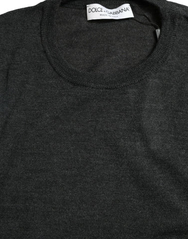 Gray wool round neck pullover sweater by Dolce & Gabbana, showing a close-up of the soft knit fabric and classic fit.