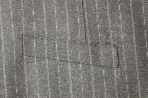 Gray striped wool vest with Dolce & Gabbana logo, sleeveless gilet featuring a stylish, textured pattern.