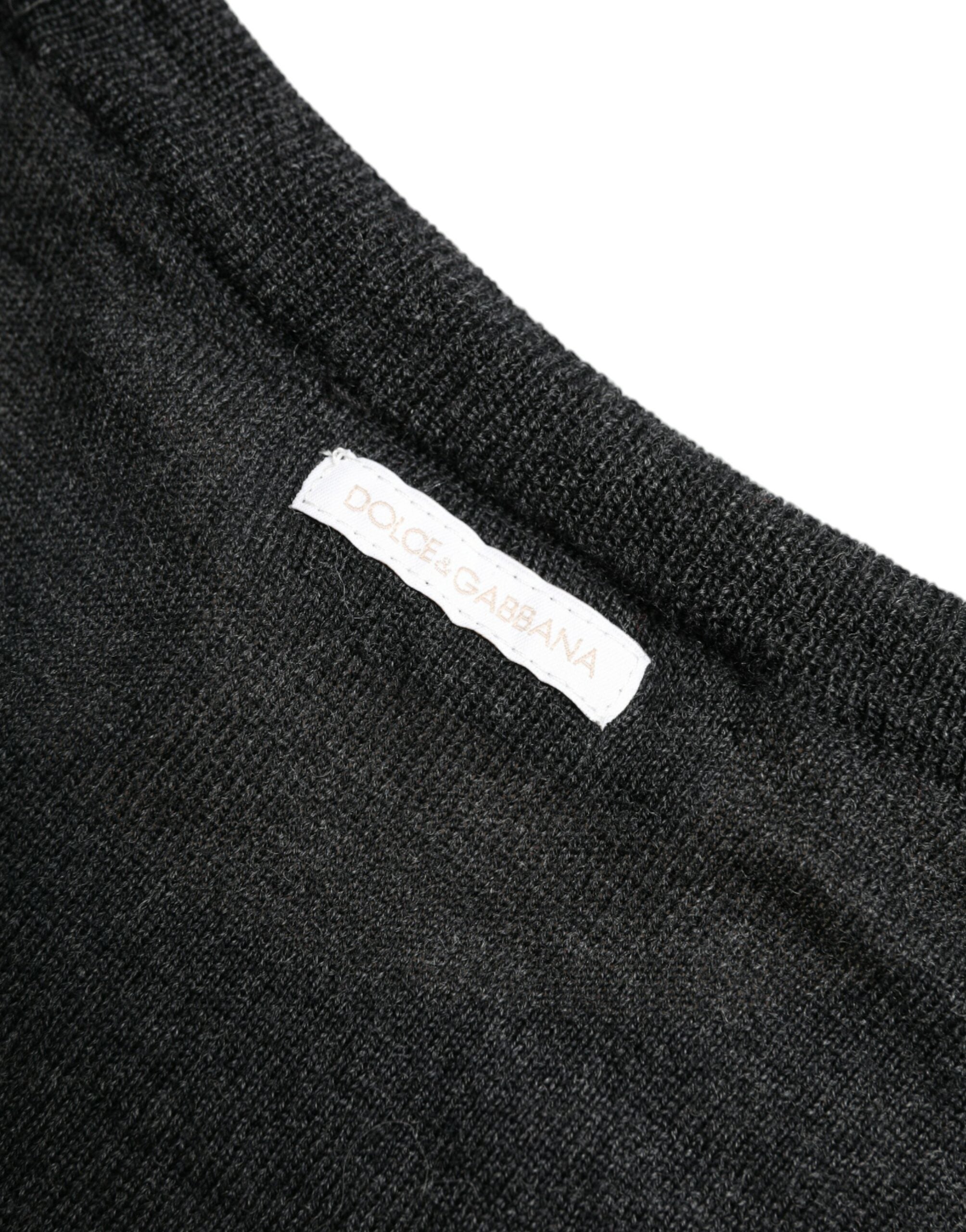 Gray wool round neck pullover sweater by Dolce & Gabbana, featuring a classic fit and soft knit texture.