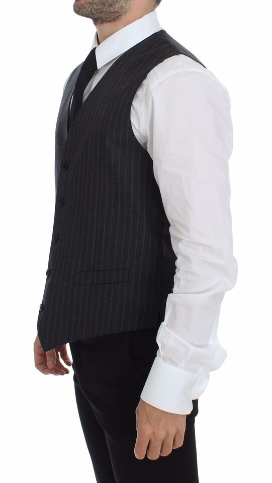 Gray wool vest with striped pattern and Dolce & Gabbana logo, sleeveless gilet style, tailored for a sophisticated look.