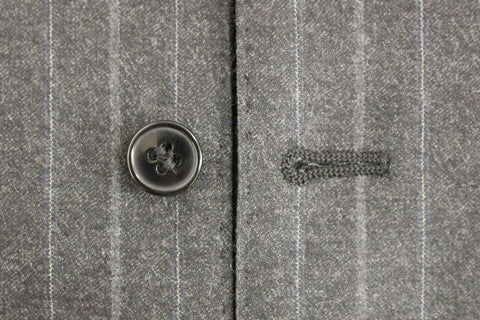 Gray striped wool logo vest by Dolce & Gabbana, featuring a sleeveless design and classic wool texture.