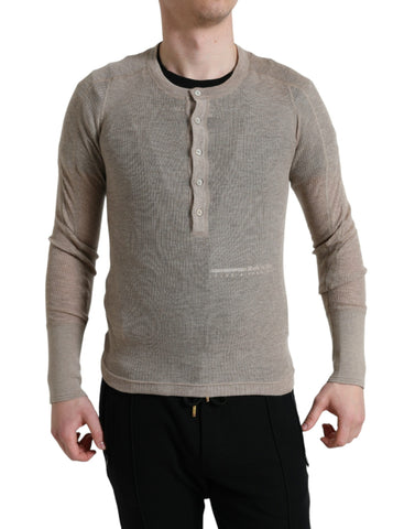 Beige cashmere Henley pullover sweater by Dolce & Gabbana, featuring a classic neckline and cozy knit texture.