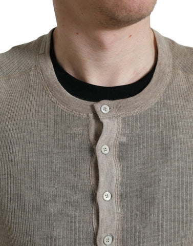Beige cashmere Henley pullover sweater by Dolce & Gabbana, featuring a classic collar and comfortable fit.