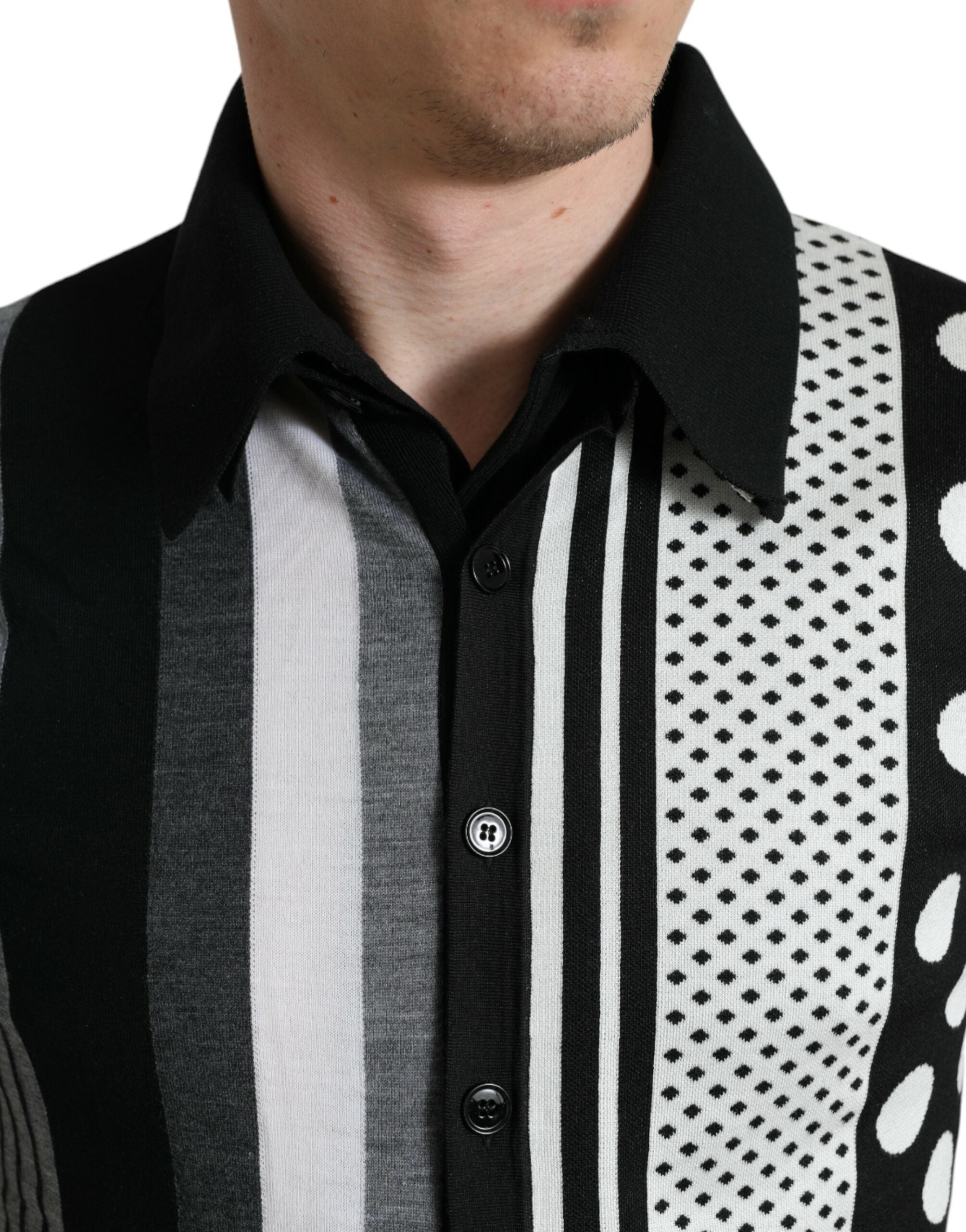 Black and white Dolce & Gabbana jumper cardigan with polo collar, knitted sweater featuring a classic design and textured fabric.