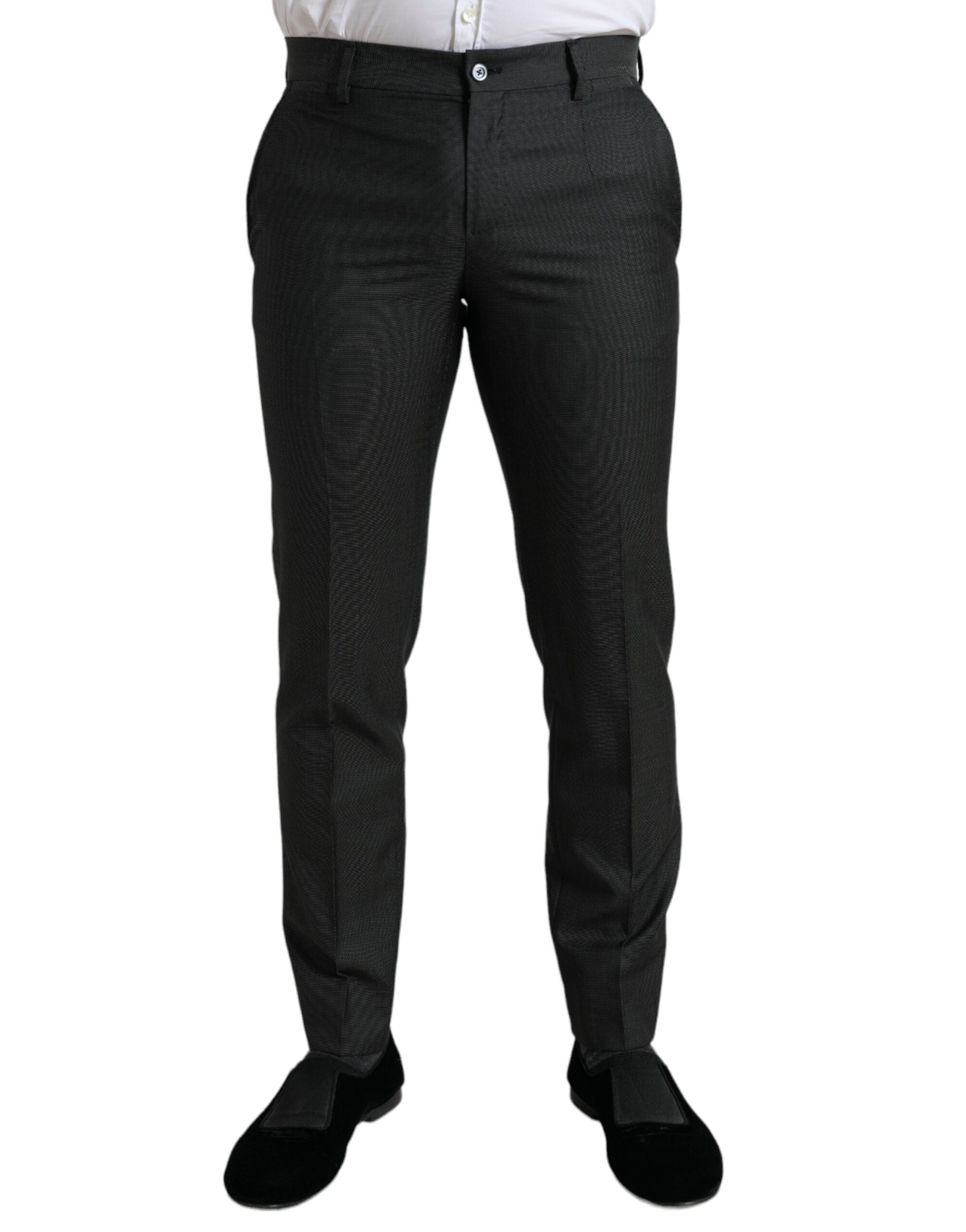 Dark gray stretch slim formal pants by Dolce & Gabbana, shown on a hanger with a smooth fabric texture.
