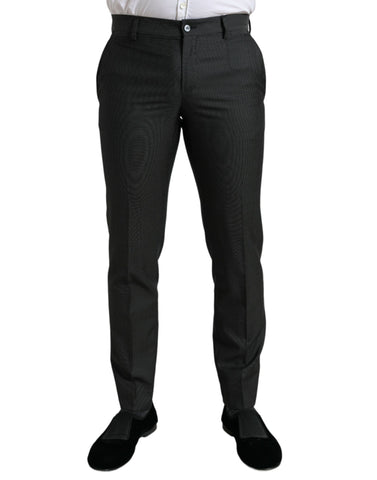 Dark gray stretch slim formal pants by Dolce & Gabbana, shown on a hanger with a smooth fabric texture.