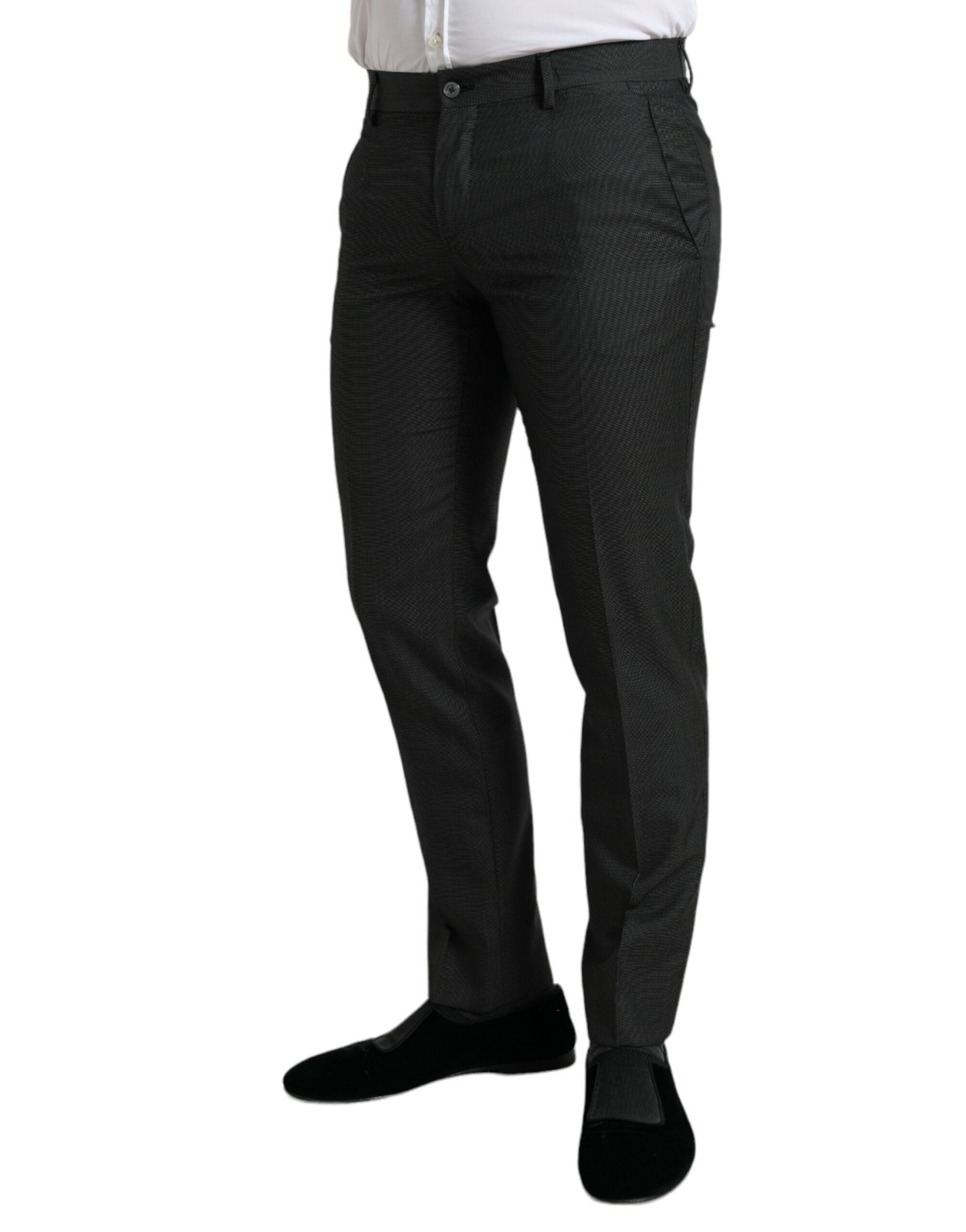 Dark gray stretch slim formal pants by Dolce & Gabbana displayed on a hanger with a tailored fit and smooth fabric.