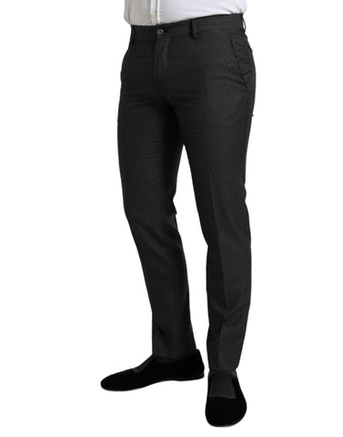 Dark gray stretch slim formal pants by Dolce & Gabbana displayed on a hanger with a tailored fit and smooth fabric.