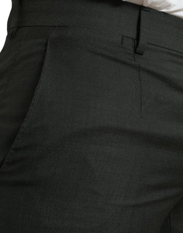 Dark gray Dolce & Gabbana stretch slim formal pants displayed on a hanger, showcasing tailored design and smooth fabric.