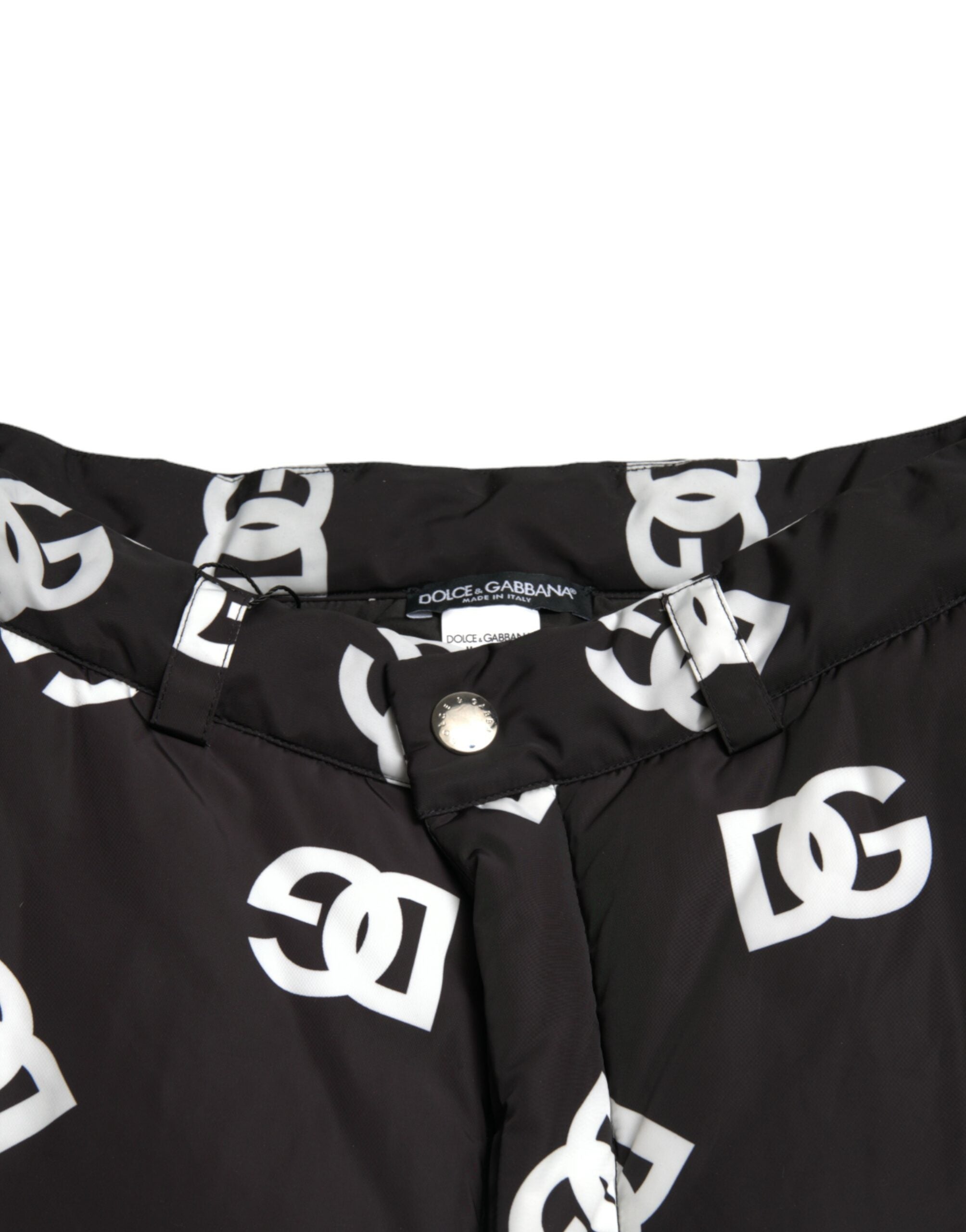 Black Dolce & Gabbana logo print wide-leg pants shown with a relaxed fit and bold DG branding on the fabric.