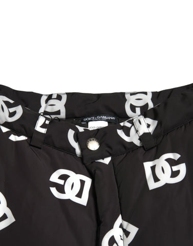 Black Dolce & Gabbana logo print wide-leg pants shown with a relaxed fit and bold DG branding on the fabric.