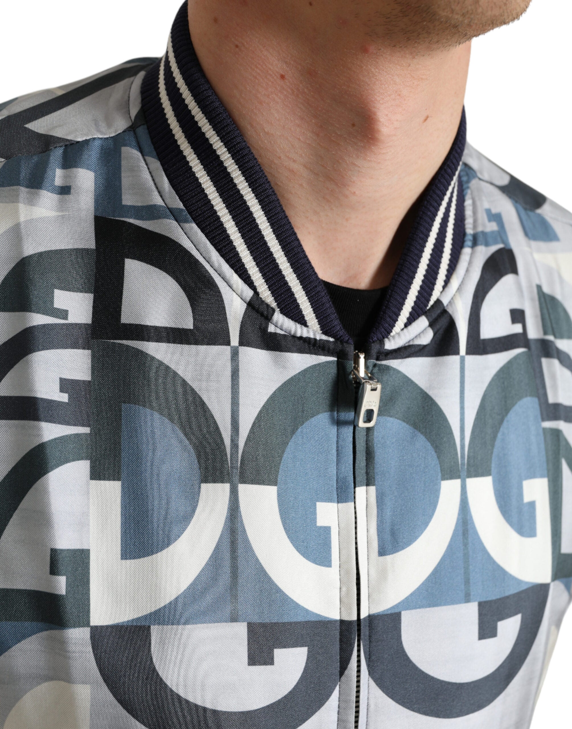 Multicolor logo print Dolce & Gabbana bomber jacket with ribbed cuffs and collar, stylish casual outerwear.