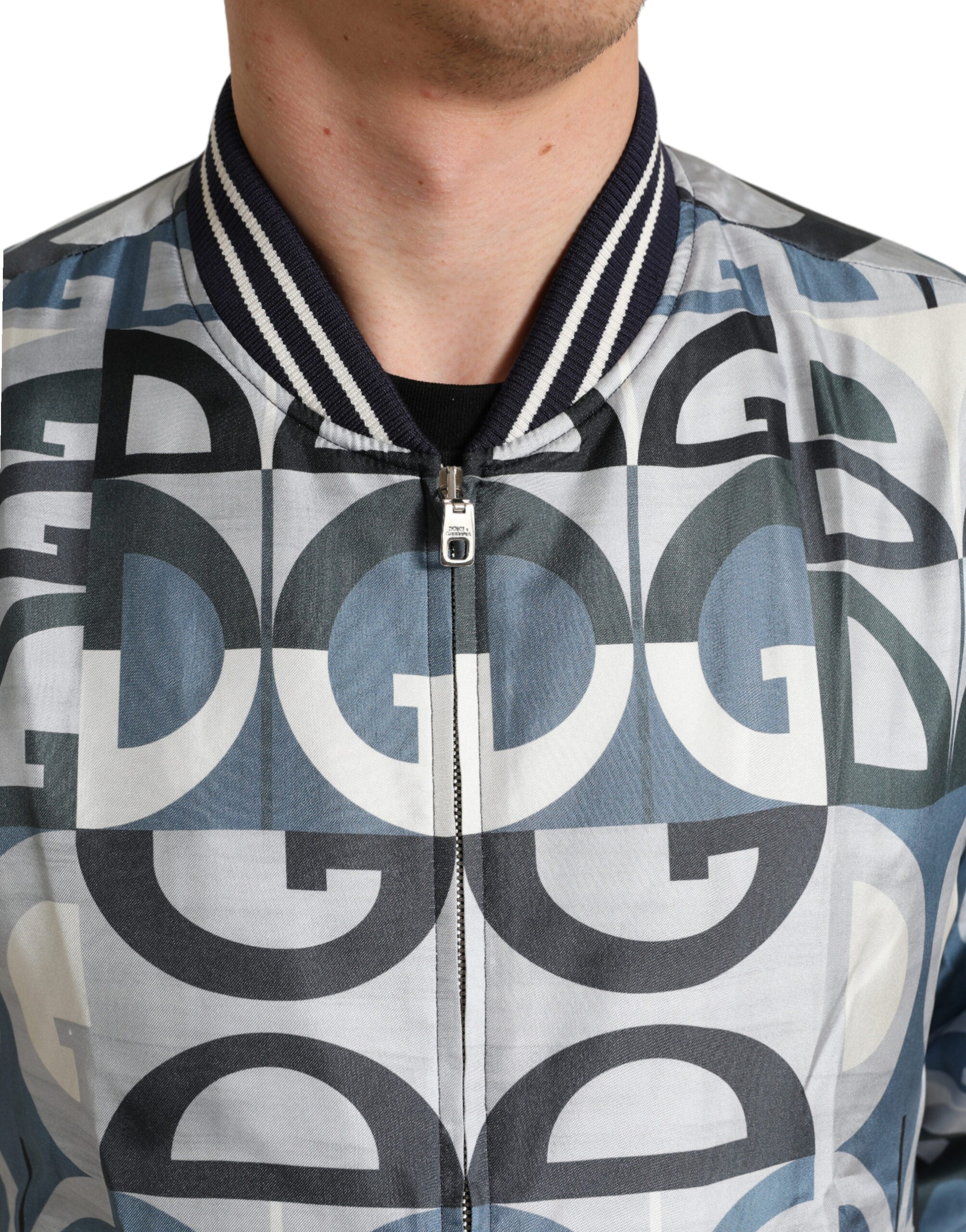Multicolor logo print Dolce & Gabbana bomber jacket with a fitted style and vibrant design, shown on a model.