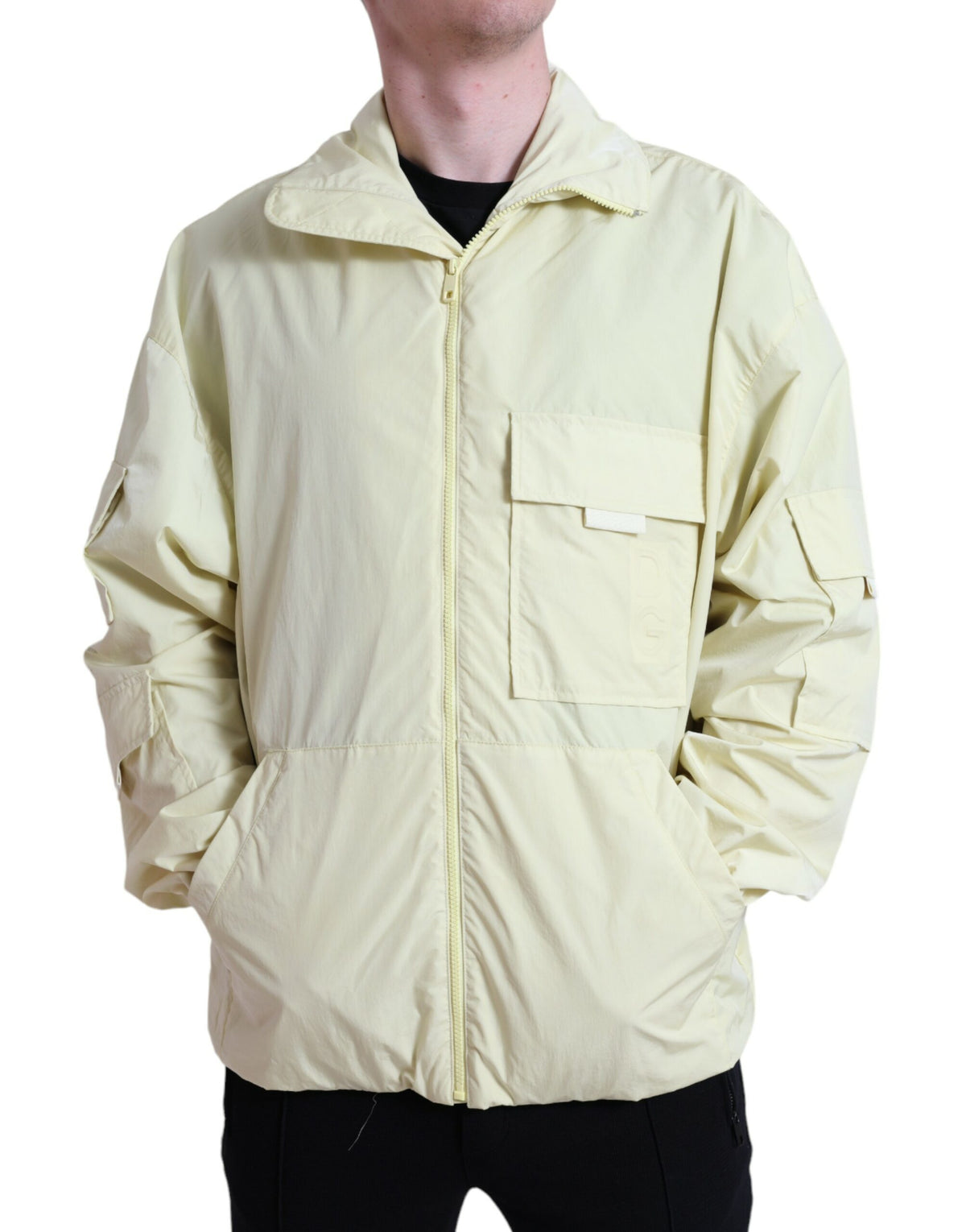 Yellow nylon collared full zip parka jacket by Dolce & Gabbana, featuring a stylish design and functional zip closure.