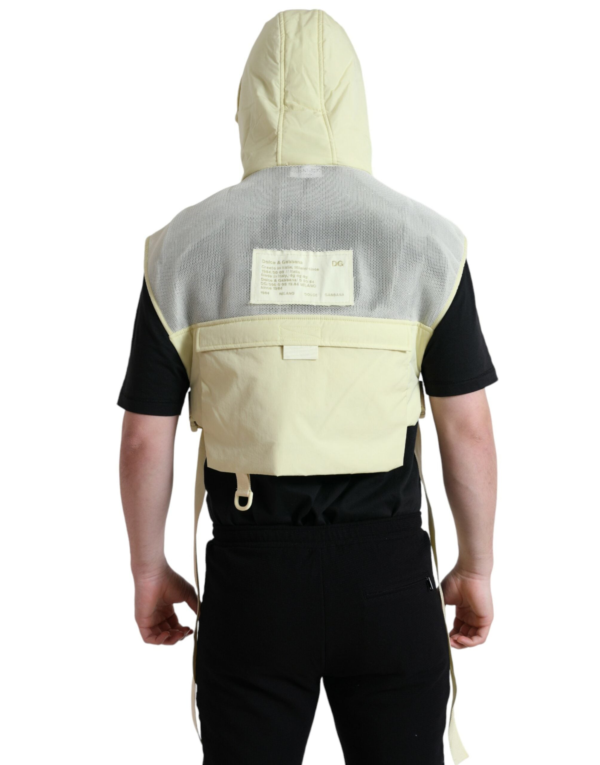 Yellow nylon hooded sportswear vest jacket by Dolce & Gabbana, featuring a lightweight design with a hood and sporty style.