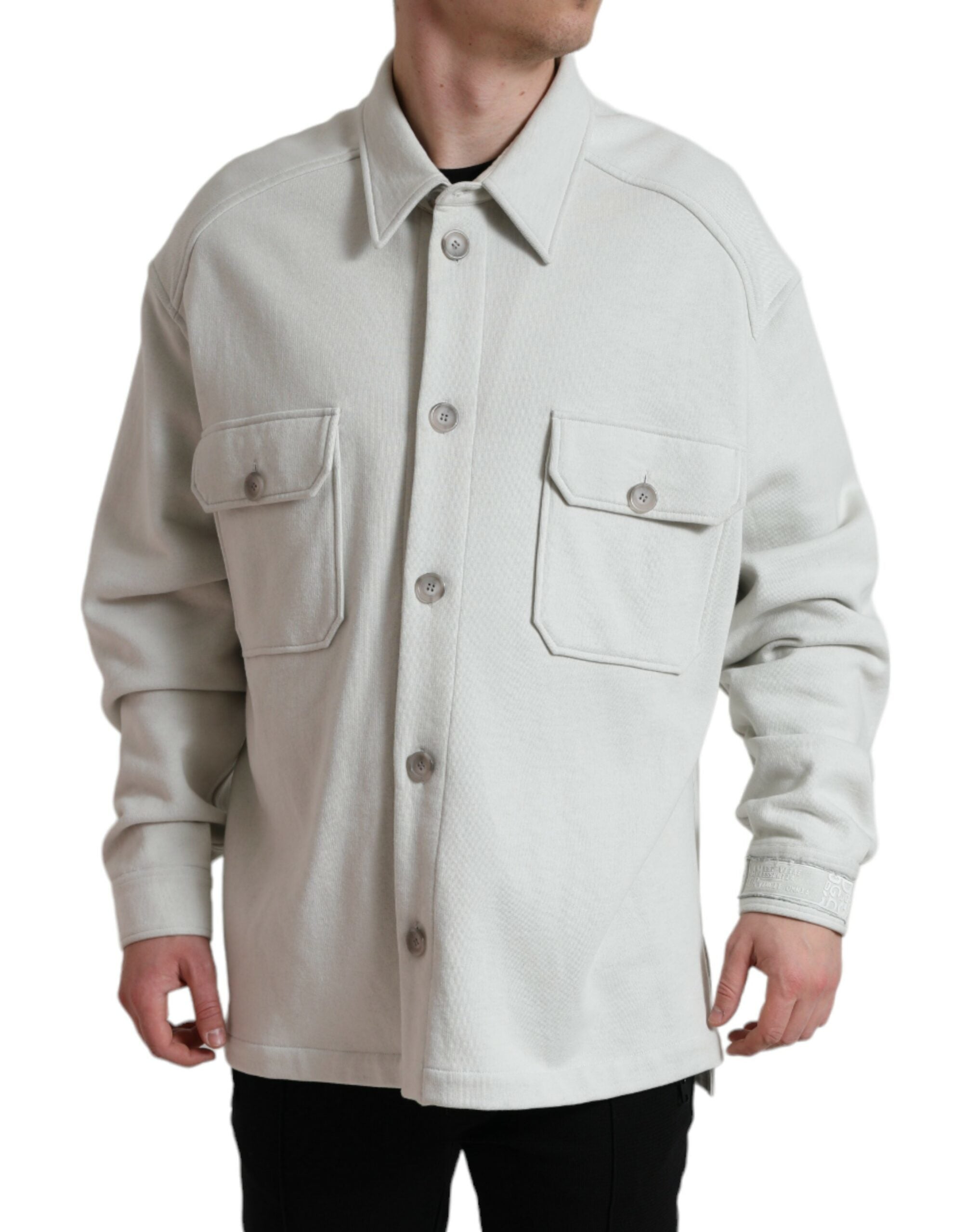 Grey cotton button-down coat jacket with a collared design by Dolce & Gabbana, shown on a hanger.