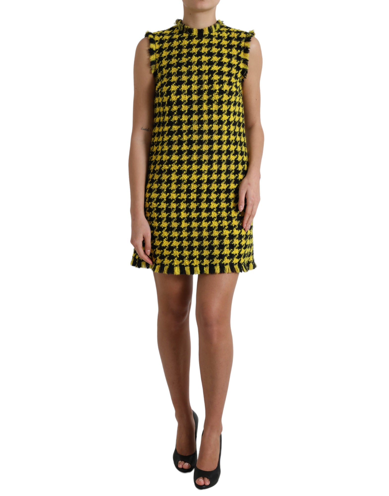 Yellow houndstooth sleeveless A-line mini dress by Dolce & Gabbana, featuring a fitted bodice and classic pattern.