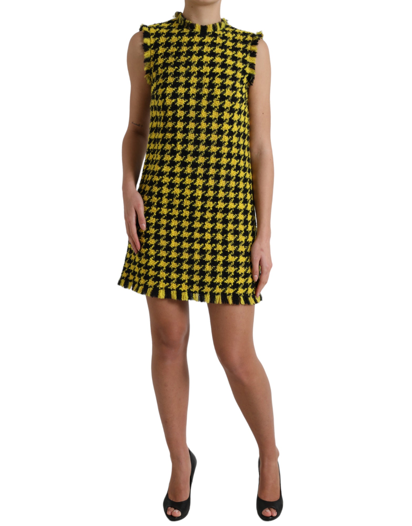 Yellow houndstooth sleeveless A-line mini dress by Dolce & Gabbana, featuring a fitted bodice and classic pattern.