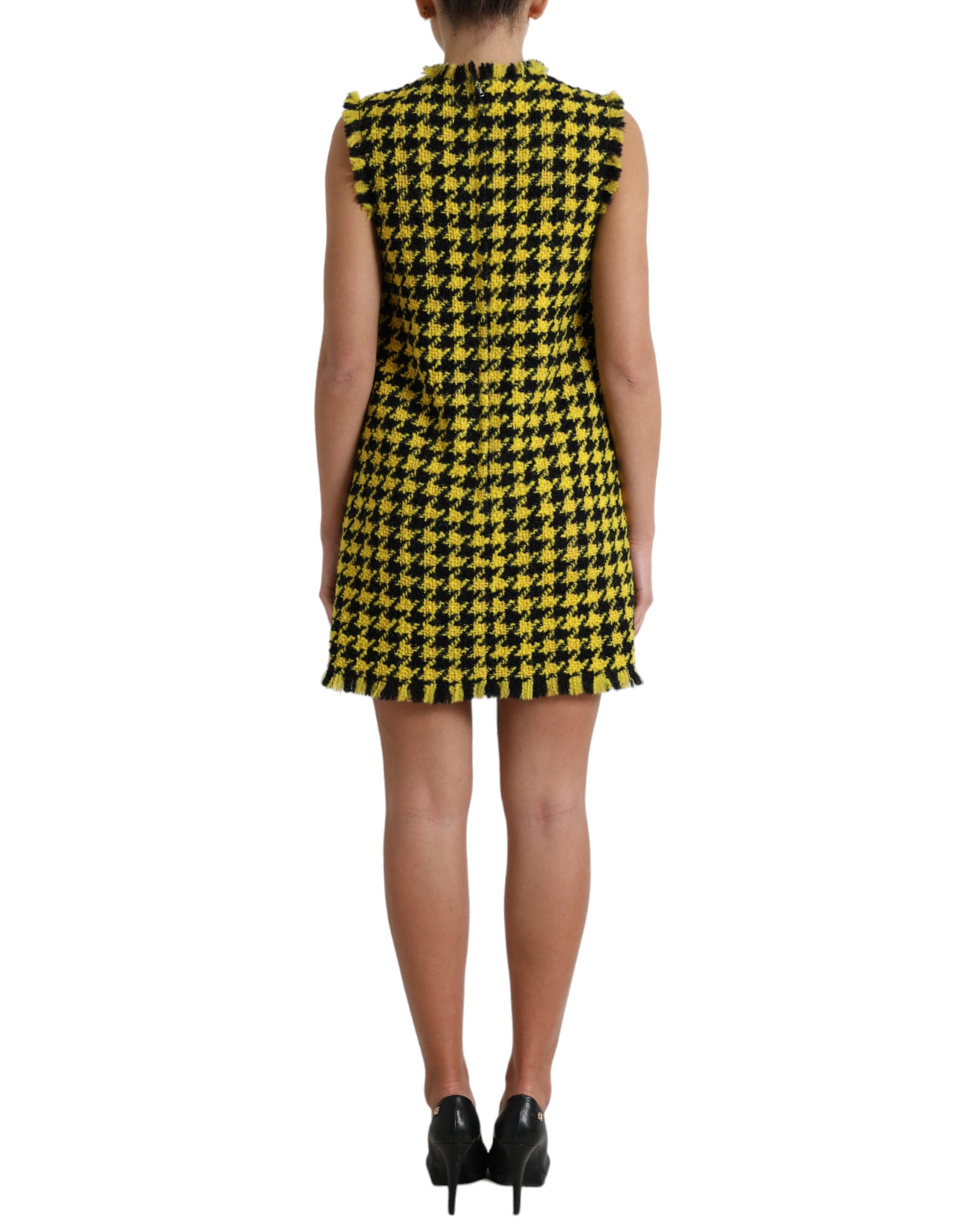 Yellow houndstooth sleeveless A-line mini dress by Dolce & Gabbana, featuring a fitted bodice and flared skirt.