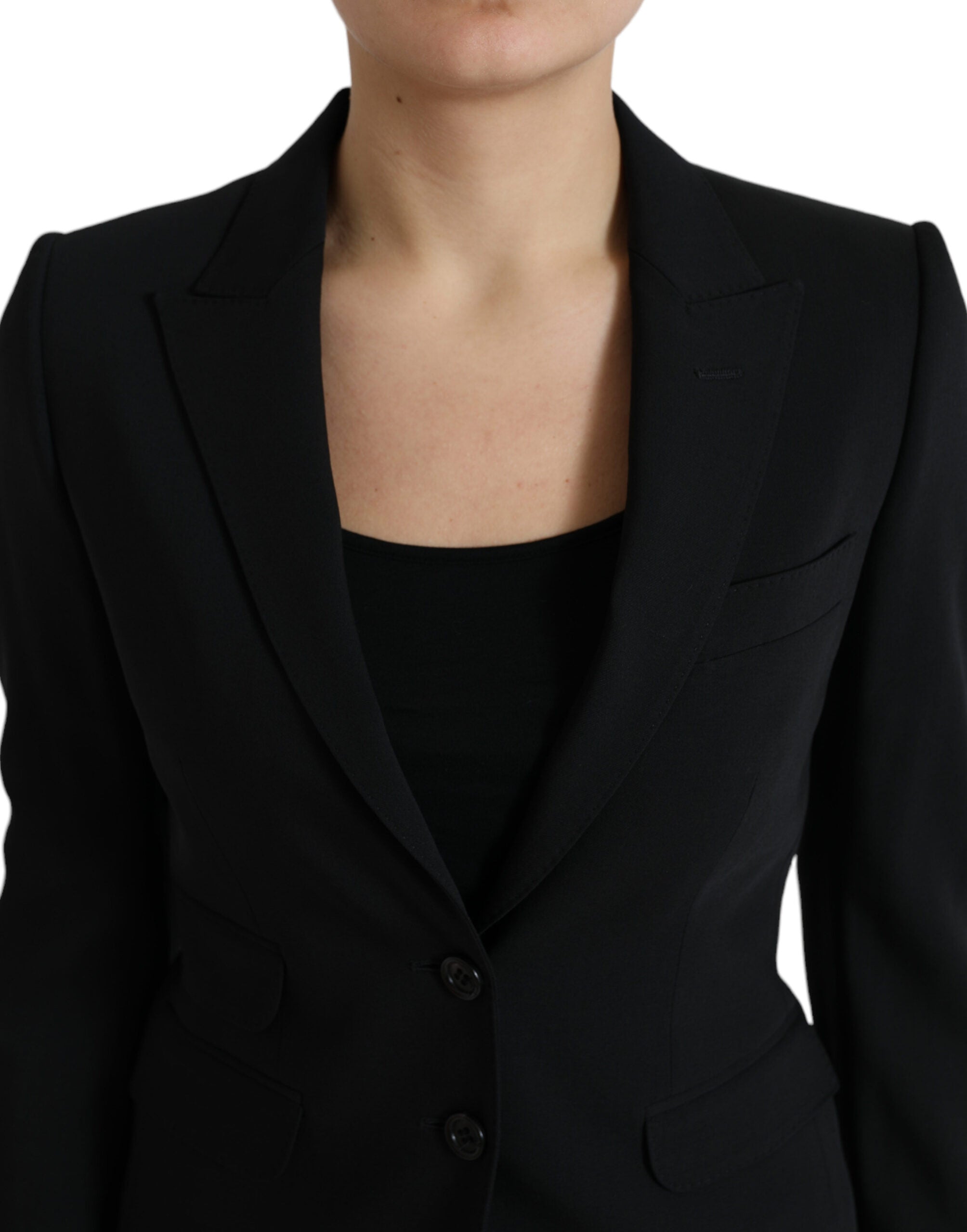 Black wool single-breasted blazer coat by Dolce & Gabbana, tailored fit with lapel collar and button closure, displayed on a mannequin.