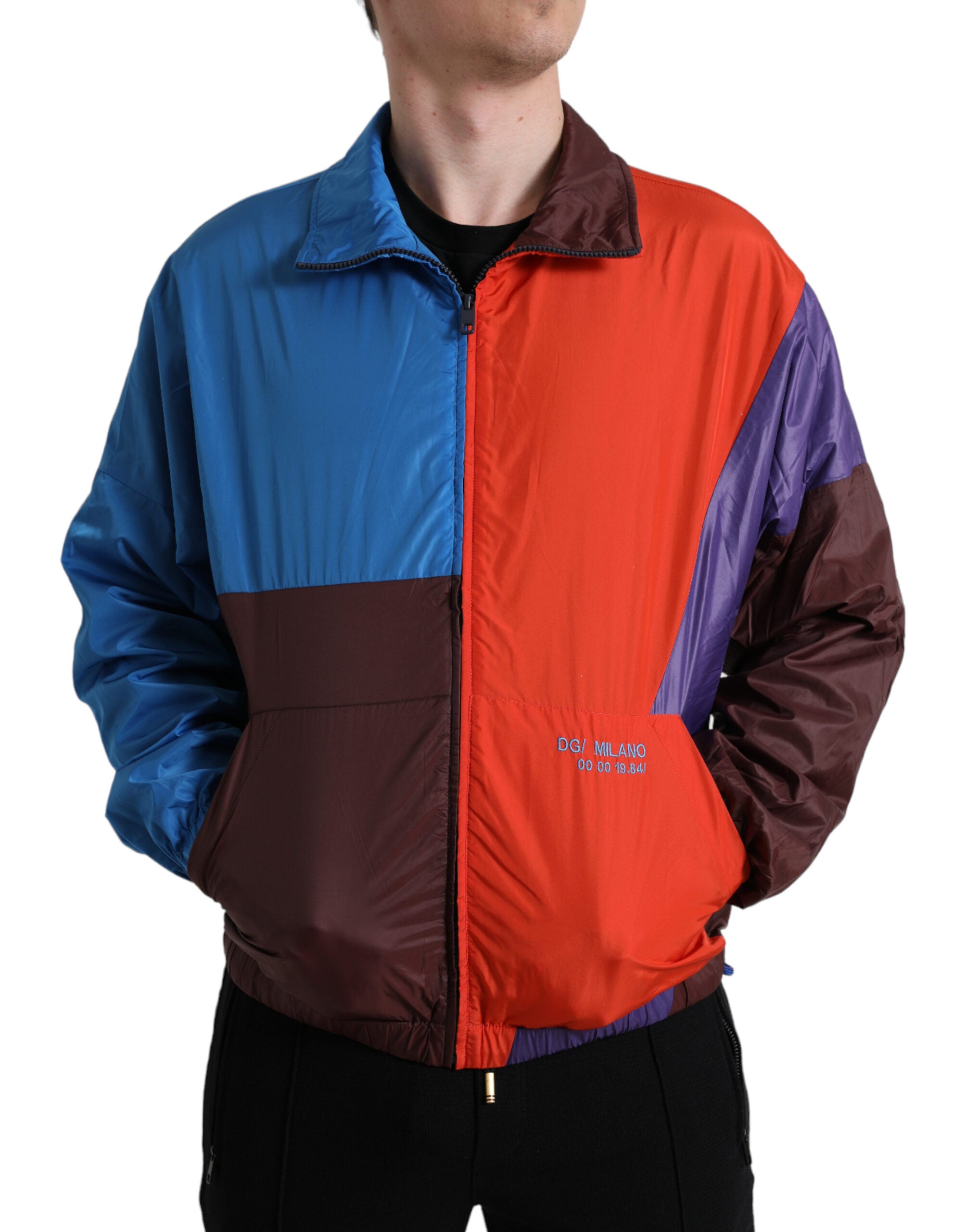 Multicolor Dolce & Gabbana windbreaker jacket with vibrant color blocking and lightweight fabric, front view.