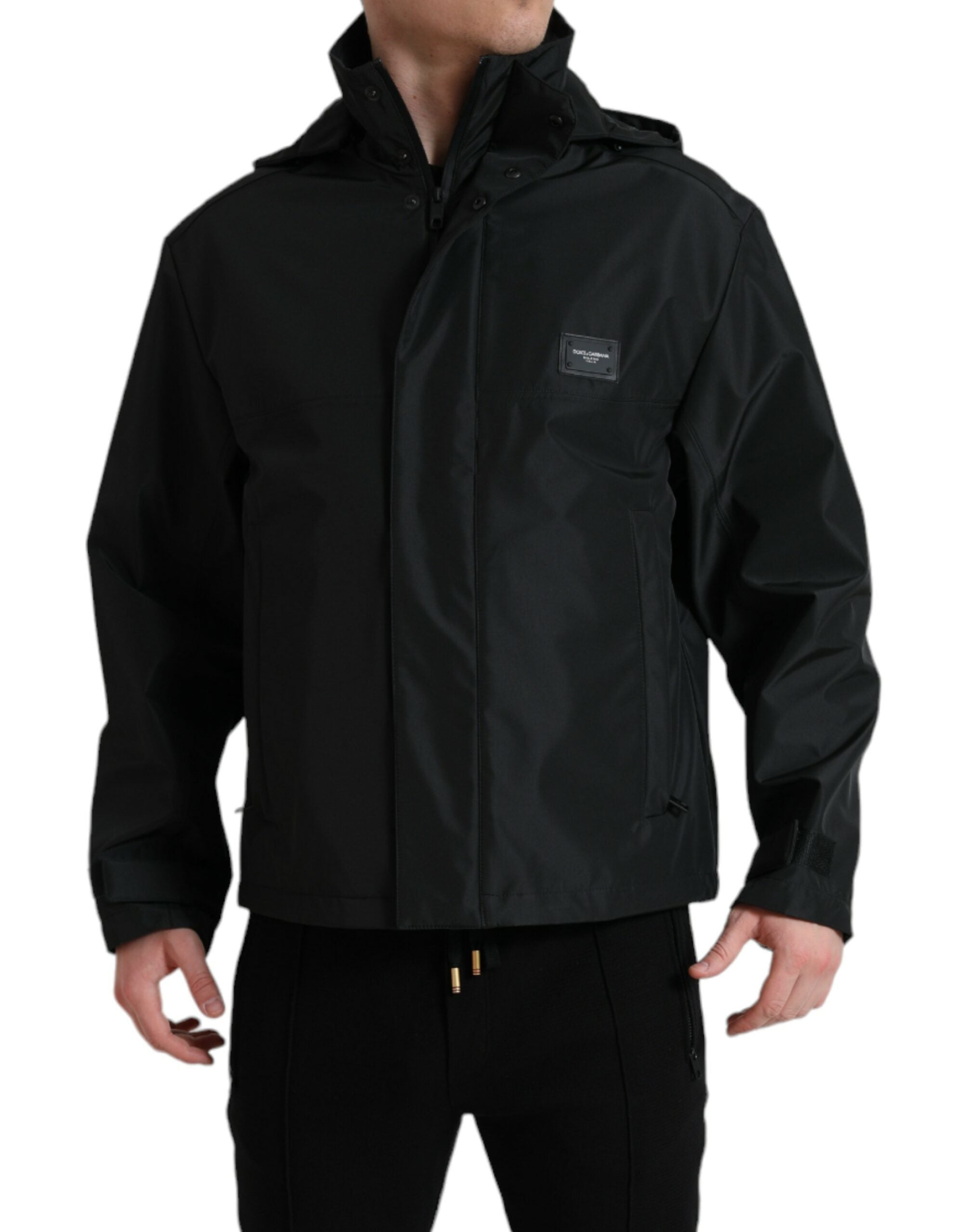 Black polyester hooded jacket with a logo plaque from Dolce & Gabbana, featuring a front zipper and casual fit.