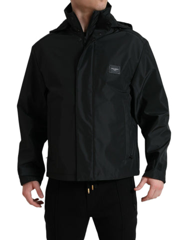 Black polyester hooded jacket with a logo plaque from Dolce & Gabbana, featuring a front zipper and casual fit.