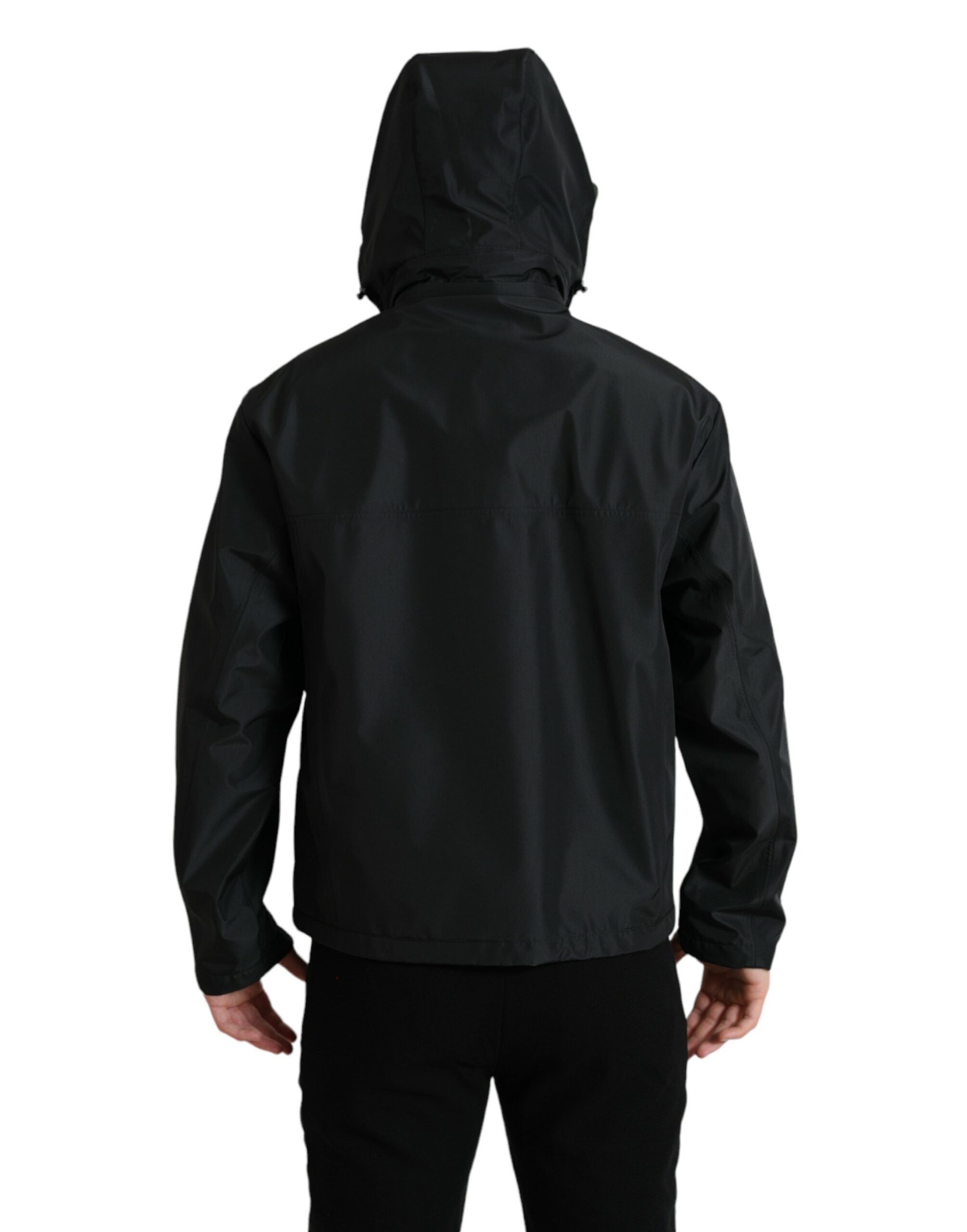 Black polyester hooded jacket with Dolce & Gabbana logo plaque, featuring a stylish, casual design and front zipper closure.